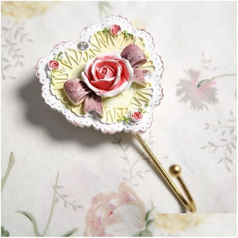 Ganci rotaie 2024 casa decorativo raiotto che agganciavavallo gancio di asciugamano a forma di fiore sier decorazione sier decorazione montata a parete goccia dhcnq