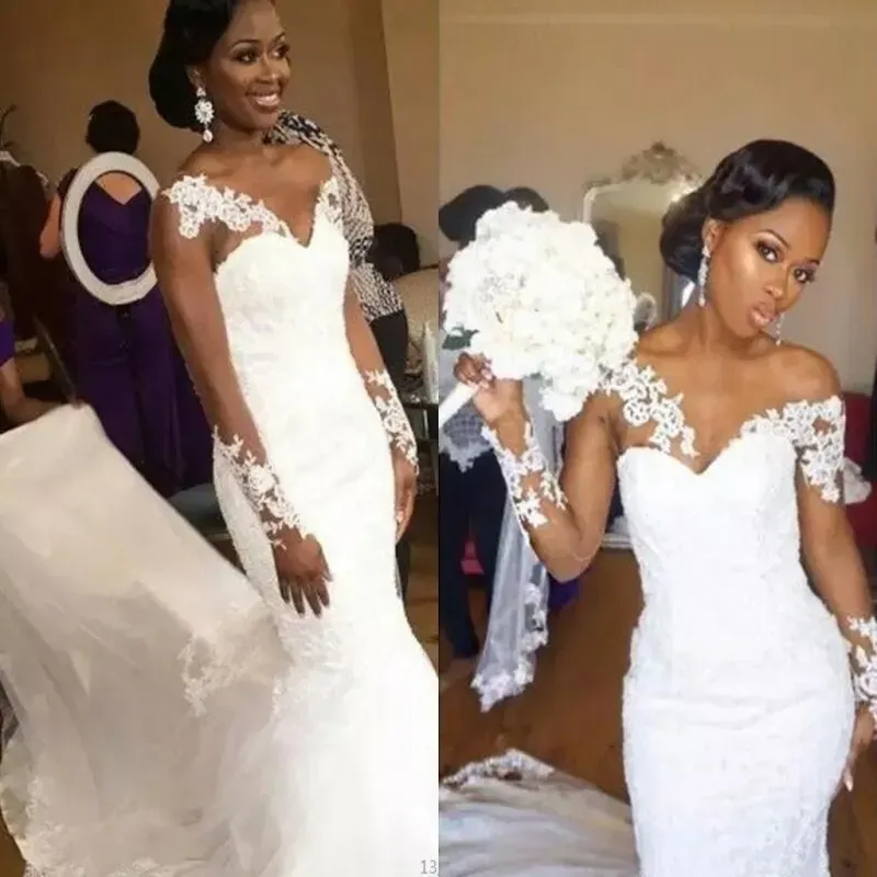 Dresses African Mermaid Wedding Dresses Sweetheart Sheer Neckline Lace Appliques long Sleeves Wedding Gowns Cunt Train Cheap Bridal Dress