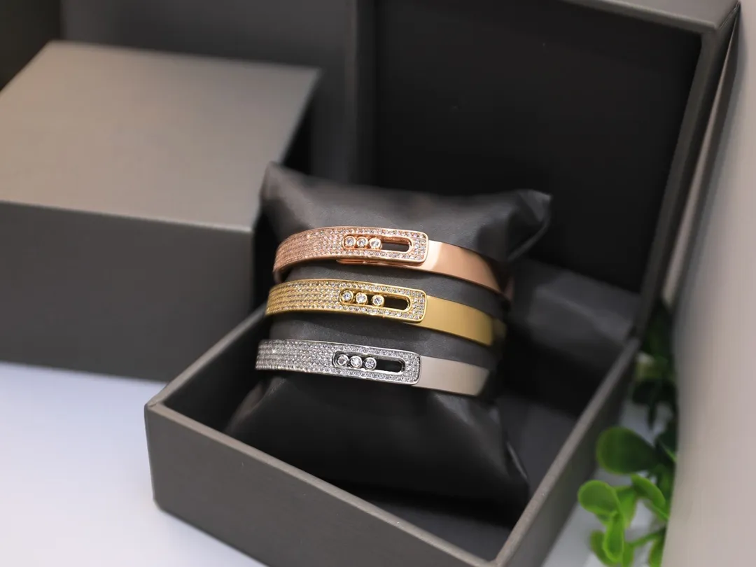 Precisione europea americana e braccialetto agile, oro rosa geometrico intarsiato con braccialetto a sfera a tre diamanti scorrevoli per donne