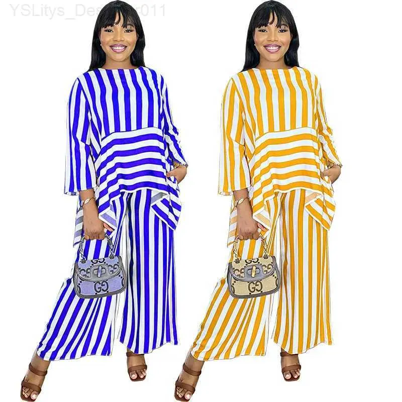 Kvinnors tvådelade byxor Kvinnor Fashion Two-Piece Striped Set African Long Sleeved Top Wide Leg Pants Striped Set British Style Womens Matching SetC240407