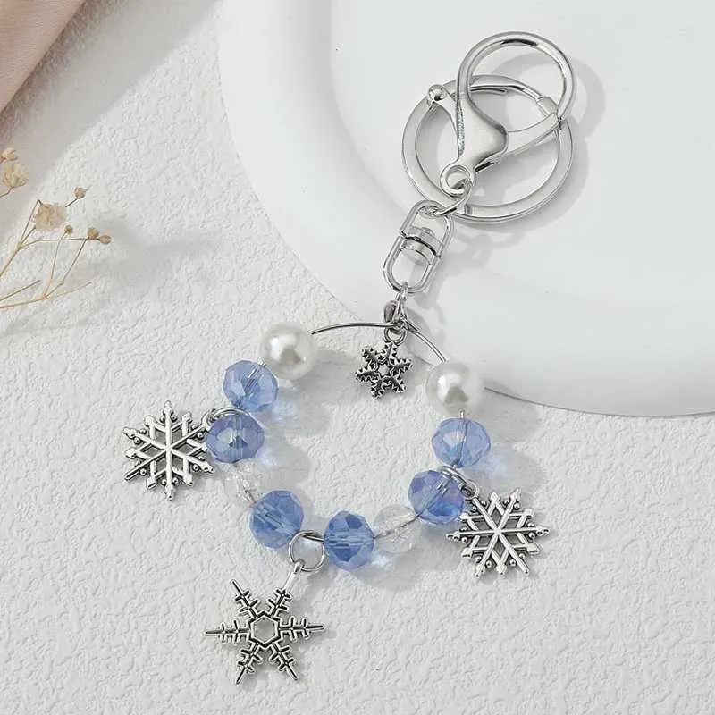 Keychains colhedos de neve de neve pequeno mamore azul de inverno de inverno anéis de neve para mulheres decoração de bolsas de bolsa de meninas q240403