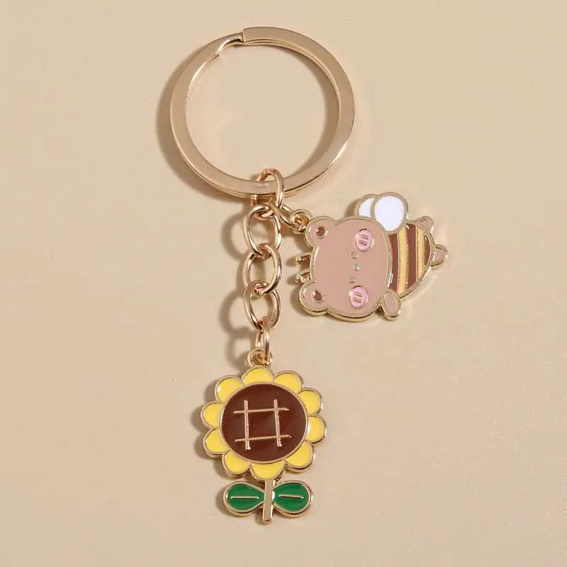 مفاتيح حبل الحبل اللطيف المينا مفتاح مفتاح عباد الشمس الطيران الأرنب الدب Bee Bee Ring Cains للنساء هدايا الصداقة يدويًا المجوهرات Q240403