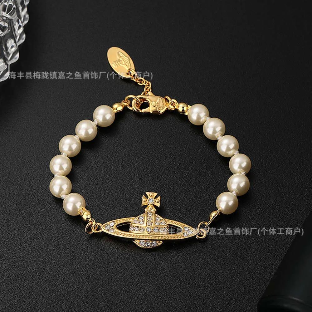 Versione alta Nuova classica Empress Dowager Bracciale Saturno Pearl con Trend di lusso di Luce Luce Diamond Female Live Streaming