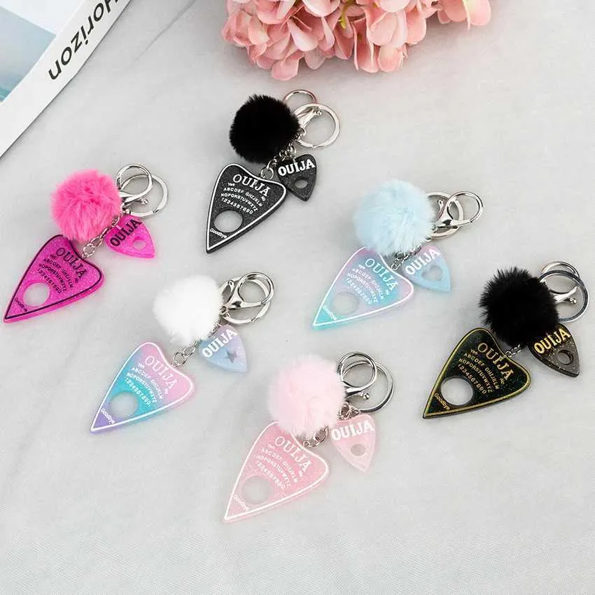 Keychains Lanyards 1 Stück Frauen Ouija Planchette Schlüsselbund Harz Fluffy Charmhandtasche mit Puffball Punkboard Handwerksmänne Q240403