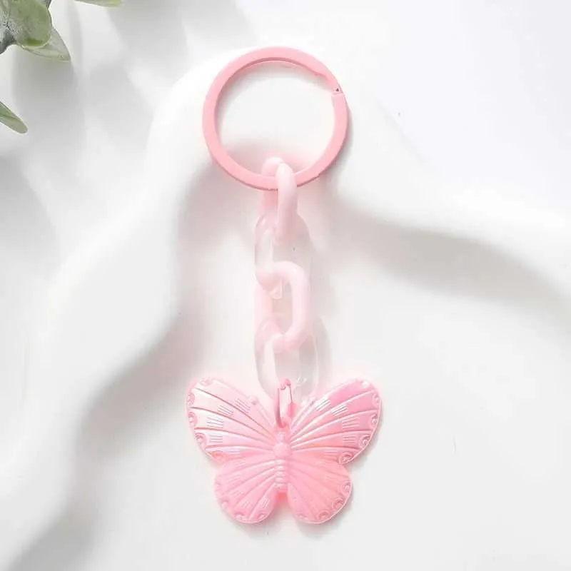 Keychains Lonyards mignons en acrylique résine Plastique papillon des animaux volants clés PENDANTS INSECTS POUR FEMMES MEN AMVANTS Valentin Gift Q240403