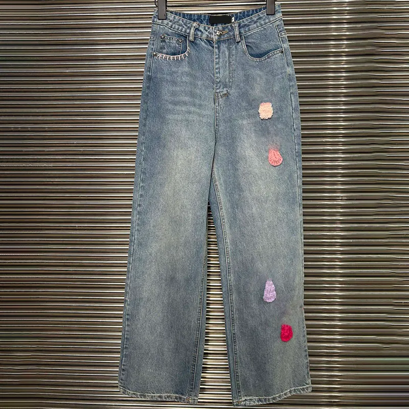 Diseñador de jeans de flujo de lujo Pantalones de mezclilla azul de mezclilla