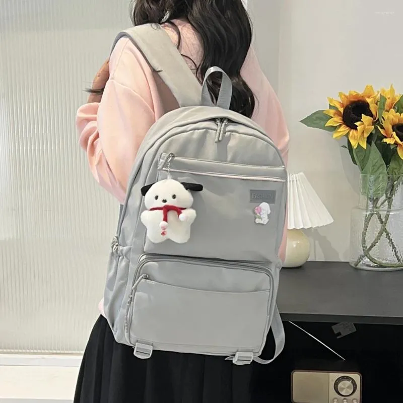 Mochila Estilo coreano de bolsa escolar infantil Estudantes de grande capacidade estudantes de cor leve cor sólida