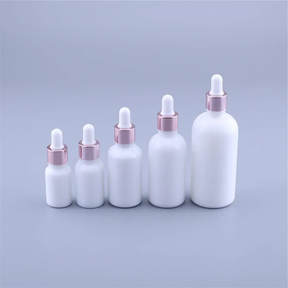 Urządzenia 10pcs 10 ml 15 ml 30 ml 50 ml 100 ml Pearl White Glass Olejki z olejku eterycznego butelki butelki kosmetyczne butelka z kroplowaniem