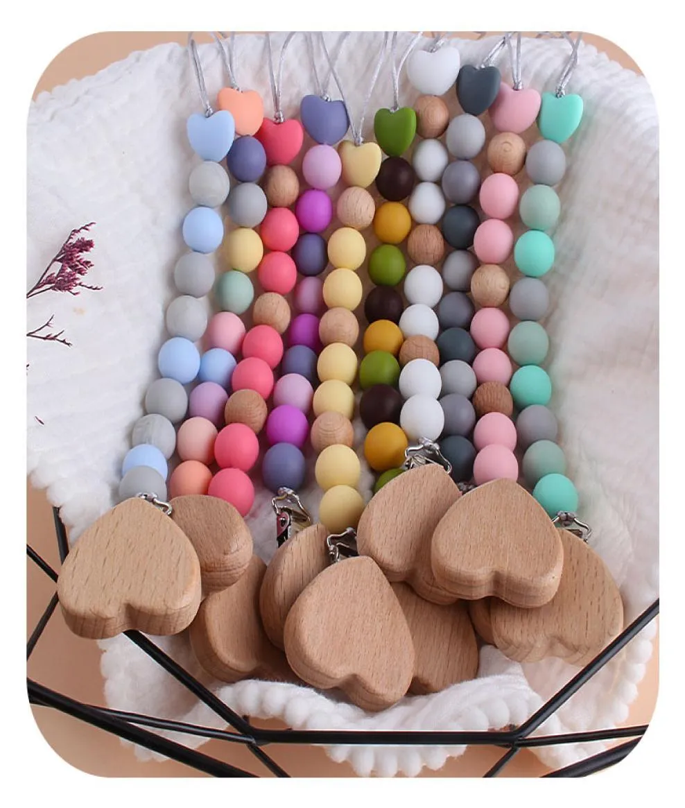 10 colores NUEVO amor Heart Wood Pacifier Clip Baby Diy Creative Pacifier Cadena Cartoon Beads Peeds de madera Soportes M31935506414