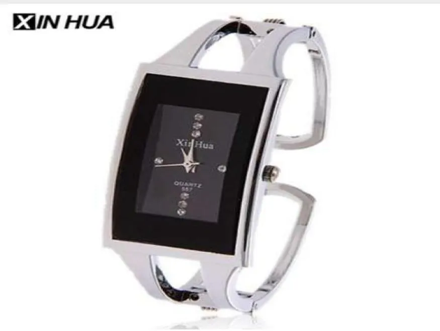 Bracelet Femmes Watch Xinhua Quartz Wristwatch Crystal Fashion Silver Casual Drop Ship en acier inoxydable Relojes Mujer Bangle Clock1751455