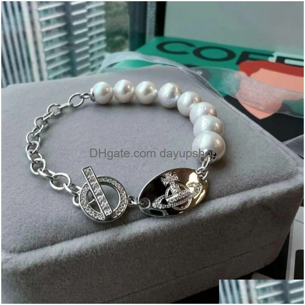 Kralen ontwerper Hoge kwaliteit 23 Nieuwe westerse keizerin Dowager Diamond Oval Pearl -armband voor damesmode Kleine veelzijdige handwerk Dhibt