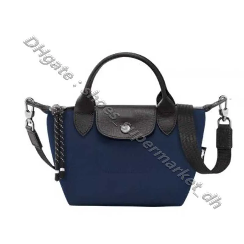 Luxurys handväska Leisure stor påse 2024 Crossbody Designer väskor Vit handväska dumpling Nylon Vattentät kapacitet shopping handhållen axel bun crossbody sacoche