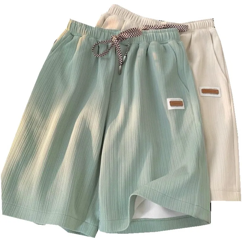 Swobodny projektant mens sportowy szorty kieszonkowe solidne sznurka na plażę krótkie spodnie letnie cienkie spodnie luźne spodnie dresowe