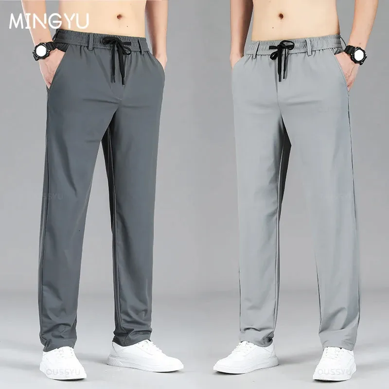 Vêtements de marque Pantalon décontracté mince Men Men de crampon élasticité élastique Jogger extérieur pantalon pantalon mâle m4xl 240407