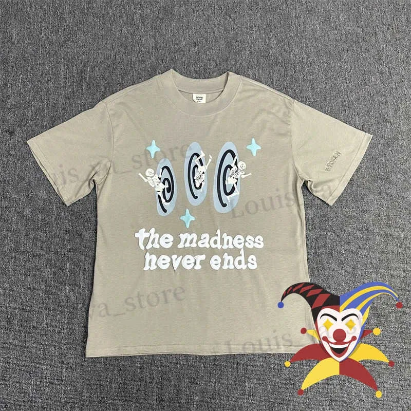 メンズTシャツアプリコット壊れた惑星Tシャツの男性女性狂気は決して終わりませんTシャツTOPS T T240408