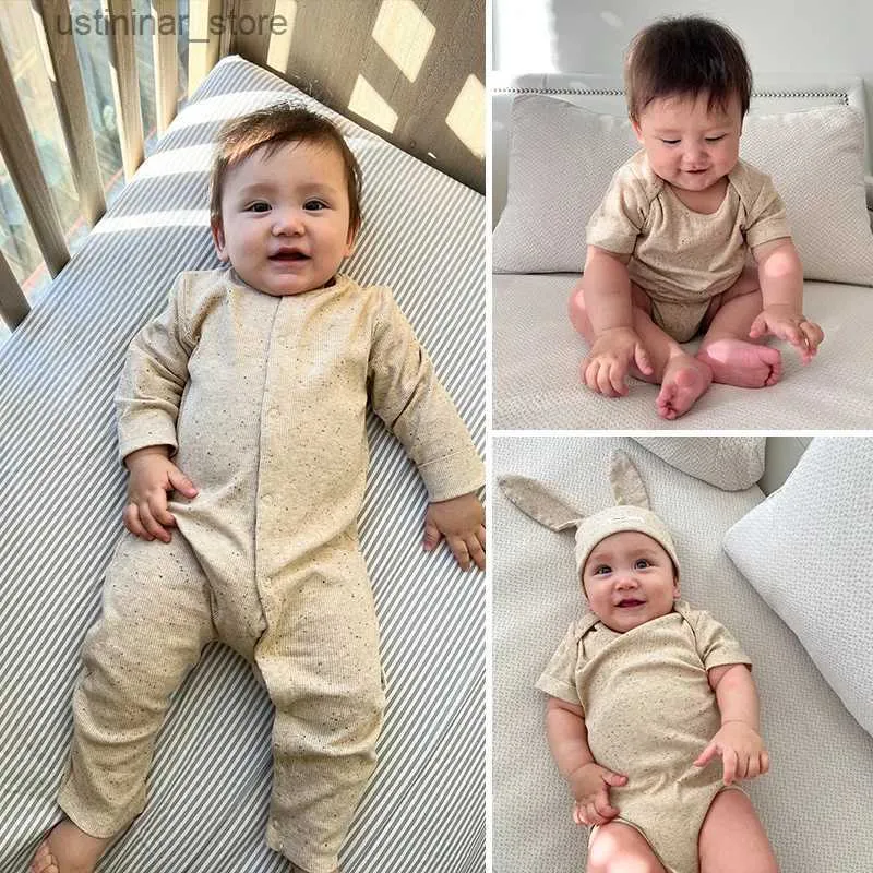 Rompers 2024 Spring herfst pasgeborene babymeisjes kleren mode solide romper hoed baby lange mouw jumpsuit peuter kleding voor meisjes jongen l47