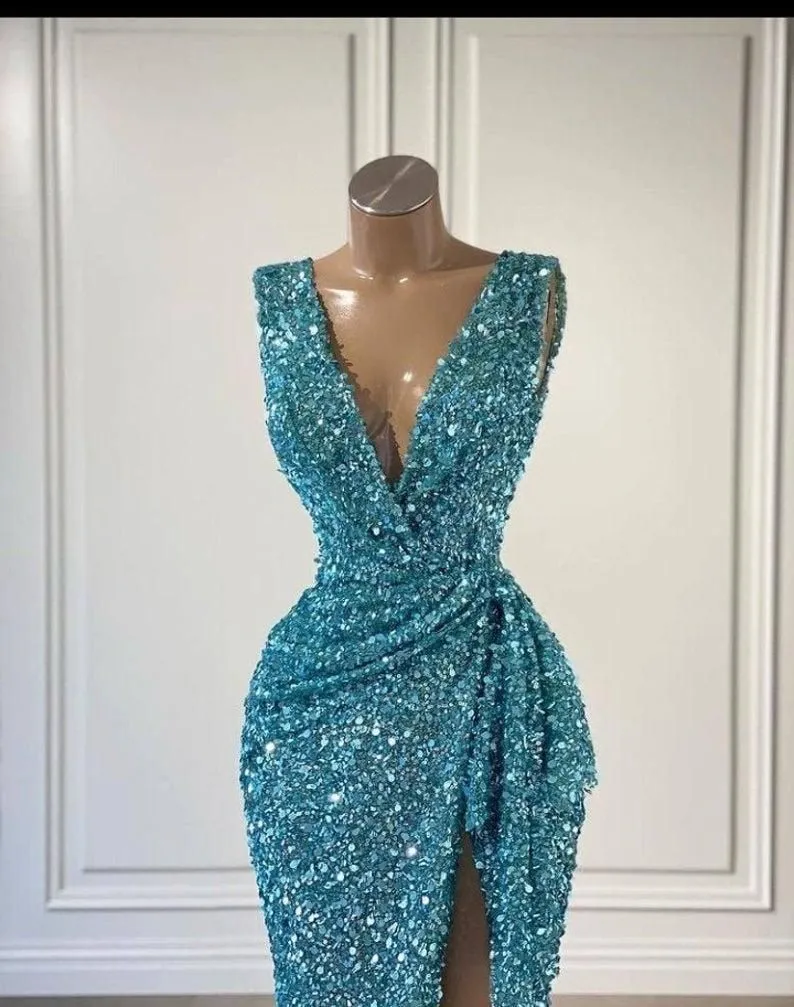 2022 Sexy Mermaid Prom Dresses Arabic Turquoise Sequined Lace Deep V Neck Ruffles Sequins High Side Split Floor Length Evening Party Gowns Special Occasion Wears