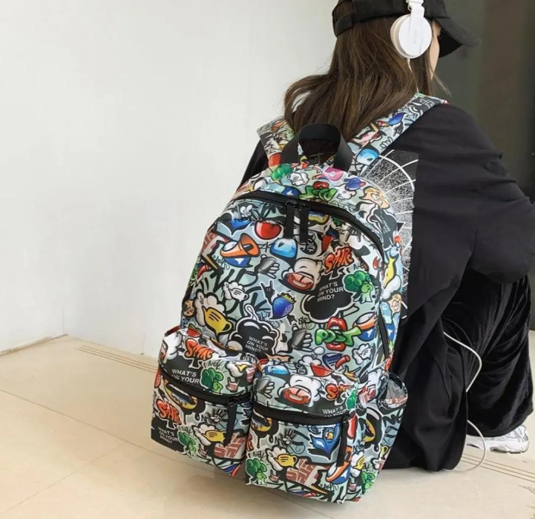 Sac à dos graffiti Imprimé pour hommes et femmes Largecapacity Sac à école Personnalité Personnalité Backpacks ordinateur portable Sports Travel4541067