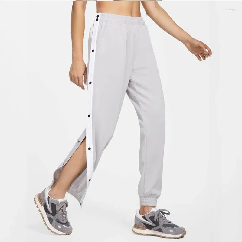 Pantalons actifs Femmes boutons latéraux déchirer le pantalon de pantalon de basket-ball