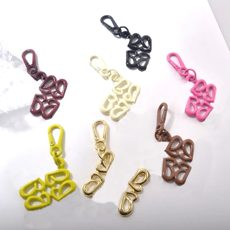 Classic Geometric Colored Keychain Fashion Alloy Keychains Designer Drip Glaze Spray Painting Key Chains Womens Mens Unisex Portable Key Rings Bags Ornament