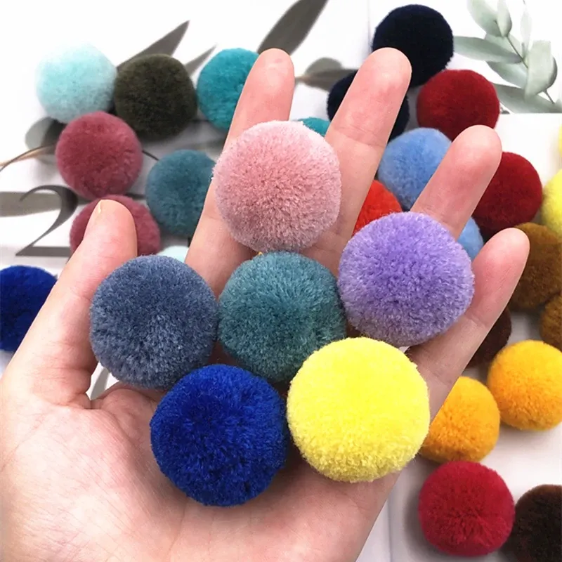 100pcs / sac 20 mm Ball en cachemire pompo