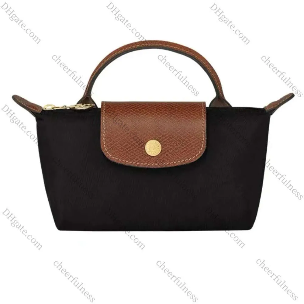 2024 Mini Fashion Cool Luxury Designer Brand Small Sac à bandoulière Femme Femme Crossbodybag Handbag Le cuir de haute qualité Sac