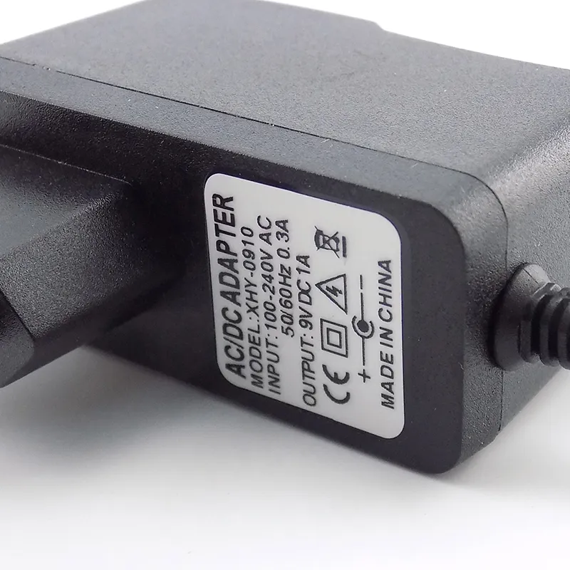 AC DC 9V 1A 1000MA Power Adapter Sucke Eu заглушка обратная полярность адаптер зарядного устройства AC 100V-240V Отрицательный