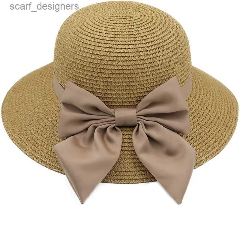 Chapeaux à bord large chapeau seau simple Bow Bow Summer Summer Fomen Women Beach Sun Hat Girl Girl Paille Panama Fedora Cap largeur Brim UV Protection Summer Cap pour femelle Y240409