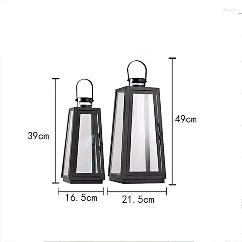 Świecane uchwyty Europejskie minimalistyczne żelaza sztuka przenośna szklana lampka wiatrowna przednia korytarz Candlestick Dekoracja retro metalowa uchwyt metalowy