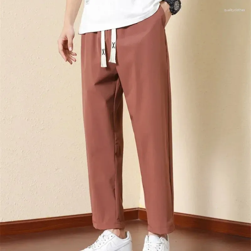 Pantalones para hombres primavera verano bolsas sólidas venda elástica elástica cintura alta deportes casuales pantalones pequeños pantalones de piernas preppy estilo