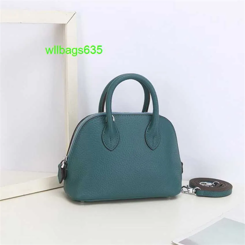 Bolide Leather Handbag Trusted Luxury Womens Bags 2024 New 18cm Shell Wrap Head Layer Cowhide Litchi Pattern Mini Bowling Ball Handheld Genui have logo HBT8KA