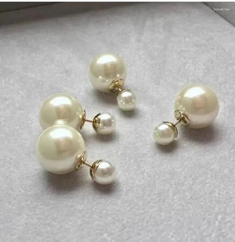 Studörhängen underbara enorma ett par 12-13mm runt South Sea White Pearl