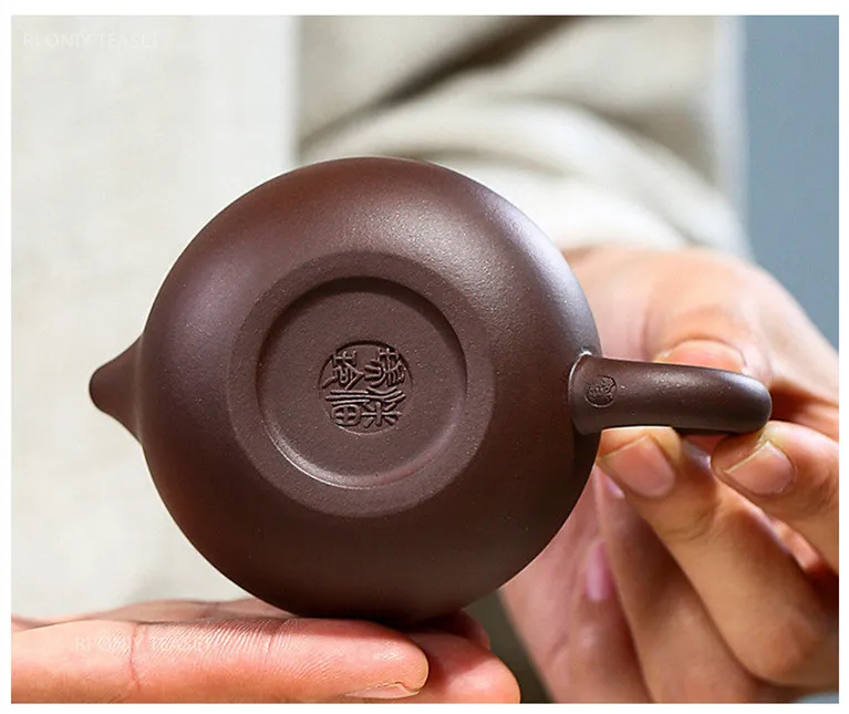 DHgate.com:Exquisite Yixing Purple Clay Teapot with Infuser DHgate.com:Exquisite Yixing Purple Clay Teapot with Infuser
