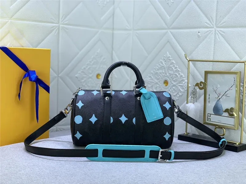 DHgate.com:Designer Luxury Leather Travel Bag for Women, KEEPALL 
