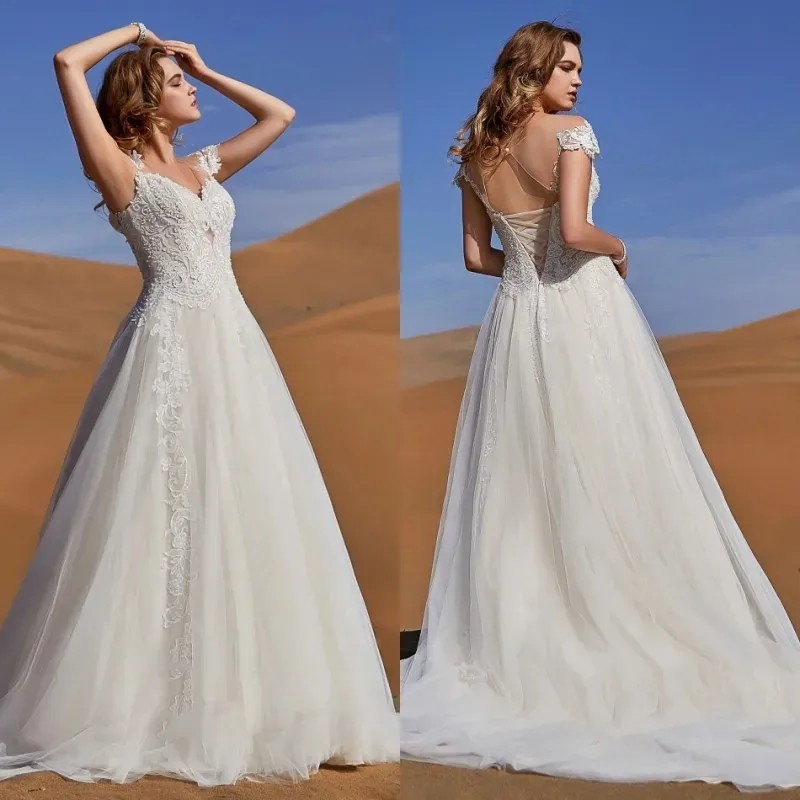 Cocomelody 2024 Wedding Jurken V Neck Lace Appliques Boheemse bruidsjurken Hollow Back Sweep Train A-Line trouwjurk Robe