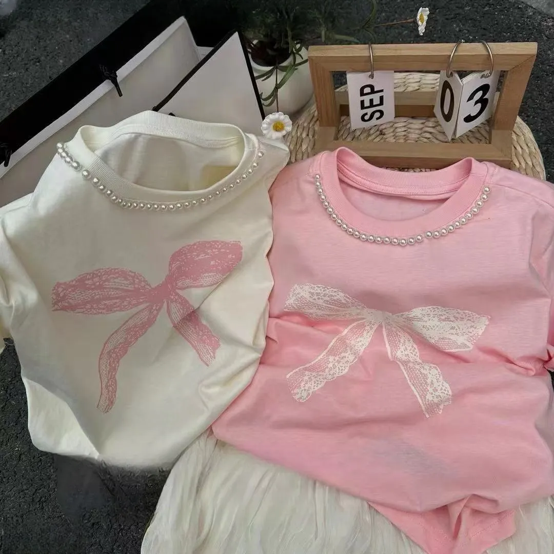 T-shirt imprimé à l'arc des enfants Summer Ins Girls Pearl Sleeve Tees Tees Children Children Casual Tops 4-10T S1313