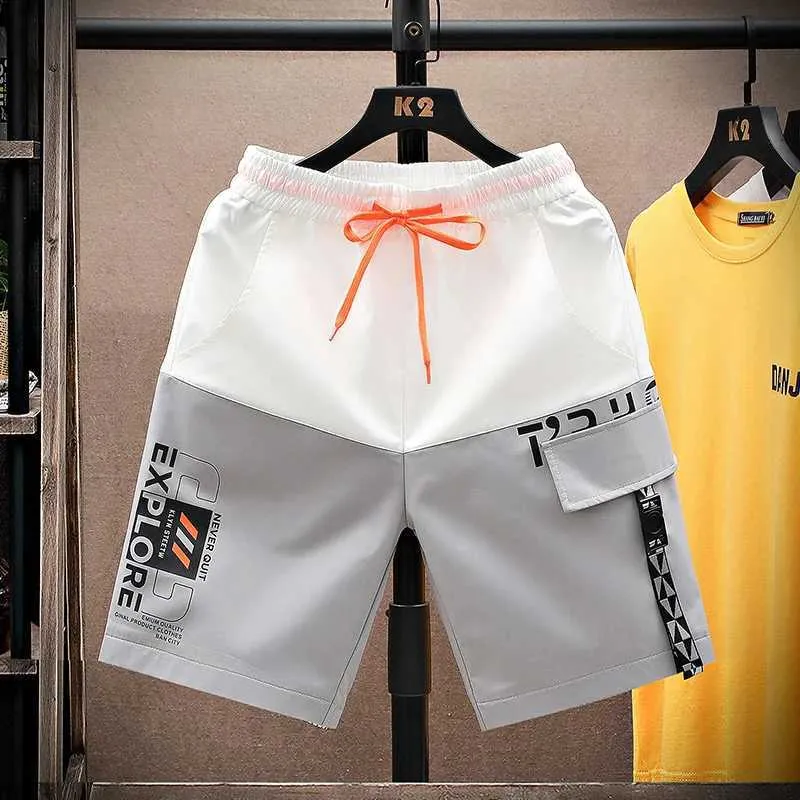 Heren shorts mode en vrije tijd 2024 zomer korte mouwen straatkleding patch werk knieprook jeugd sporten elastische taille slow lunner snel drogende broek j240409