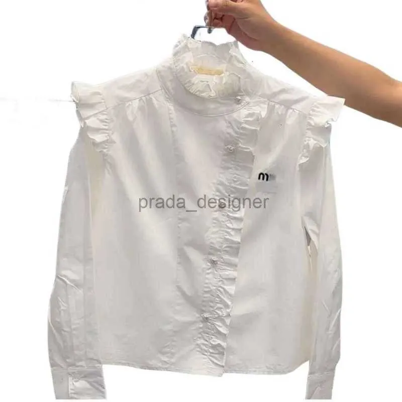 T-shirt da donna di alta qualità Maglietta femminile Luxury Women Shirt Maniche lunghe Autunno Nuovo Sentimento di Design di mercato Sentimento unico e bellissimo Top di alta qualità