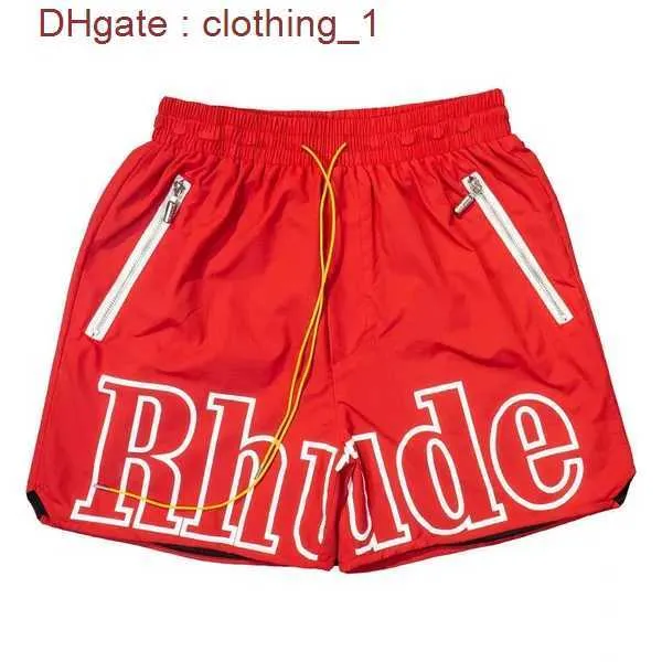 Rhude skjorta korta ärmar designer mens skjortor shorts kvinnor svettbyxor i hög kvalitet kläder sommar lyx bomullsbrev tryckt toppar strandstil tees y0p6