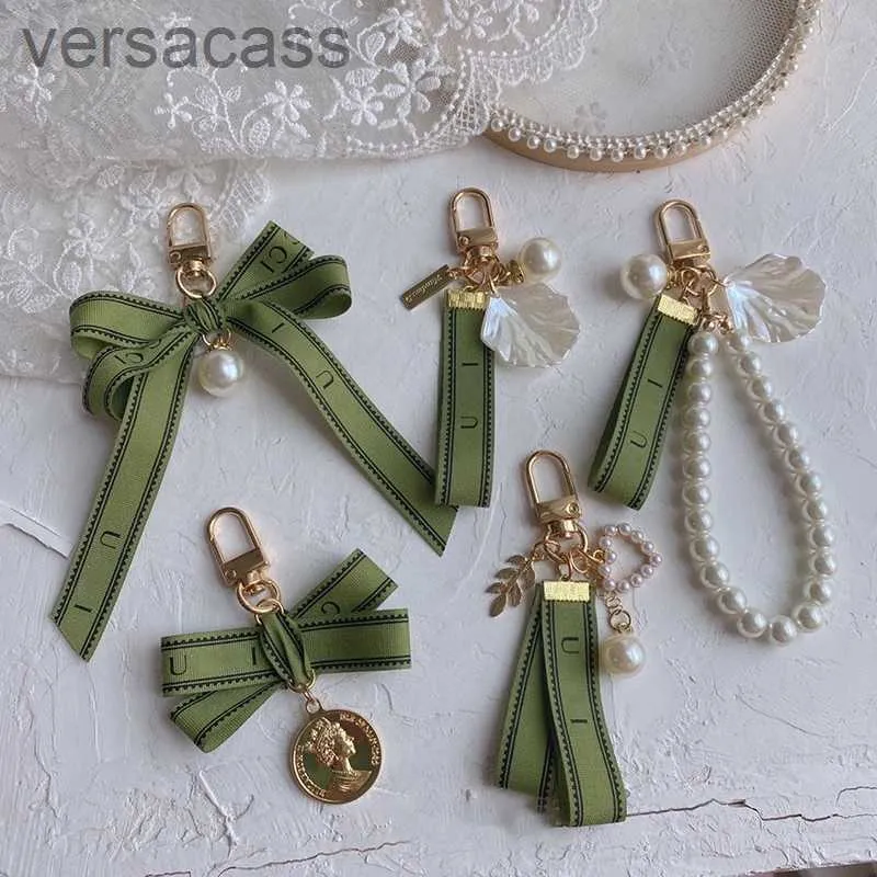 Designer nyckelring lyxiga nyckelkedja charm kvinnlig bilring pärla grönt band delikata skal par hänge gåva trevligt bra 01s5
