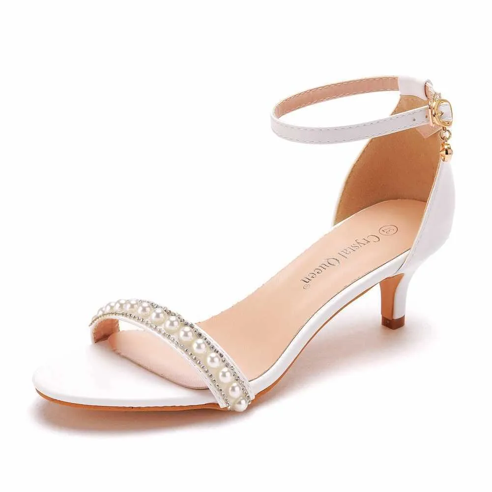 Chaussures habillées Crystal Queen Femmes Gladiateur sandales sexy White String perle High Heels Summer Party Buckles Pumps H240409 Jaui