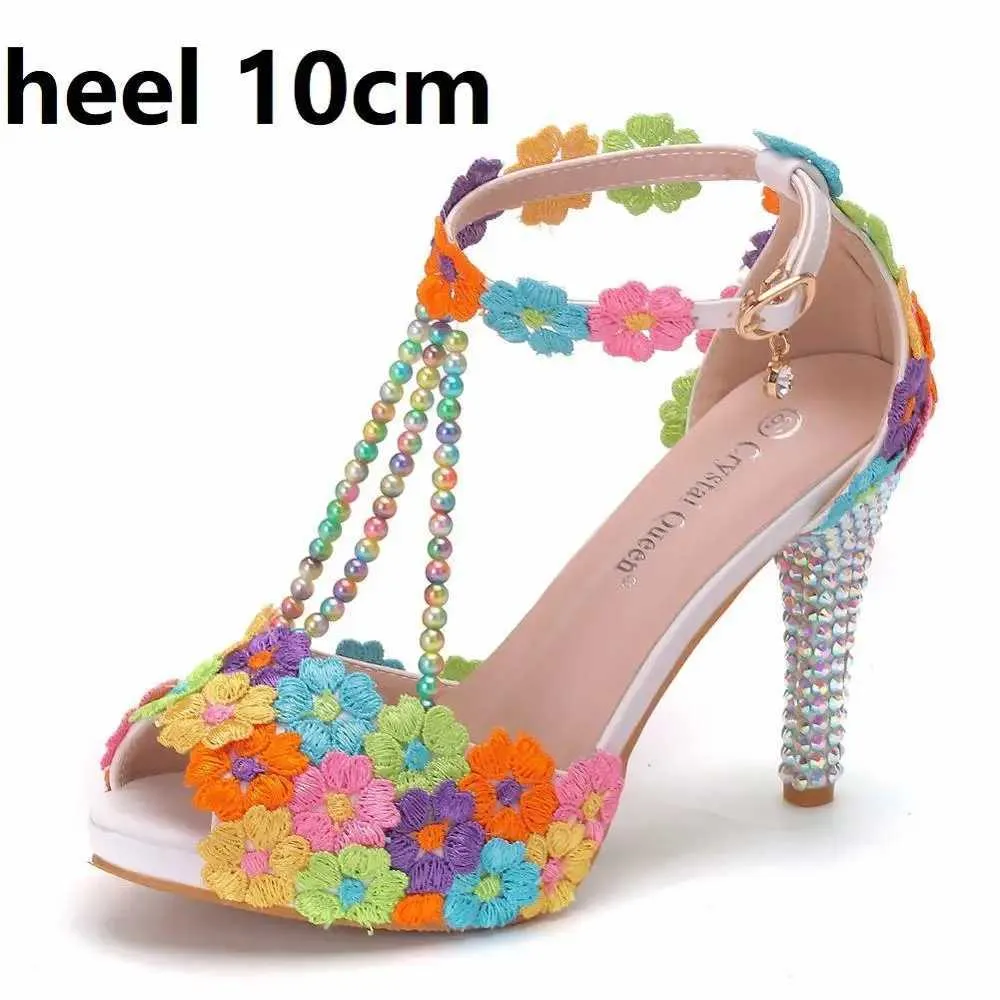 Klänningskor Crystal Queen Ankle Strap Women Sweet Fashion White Colored Floral Stilettos Party Tassel Bridal Wedding High Heel H240409 1Zbt