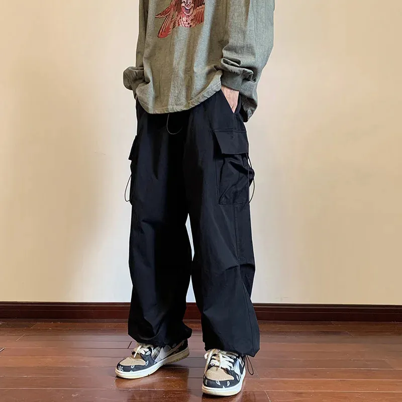 Cargo Pants Men Streetwear Hip Hop Pants Elastic Waist Harem Ankle length Trousers Black Harajuku Casual Pocket Women Pants 240403