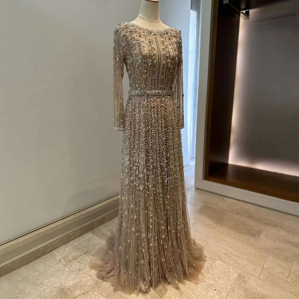 Designer Dubai Arabic Nude Beaded A-Line Evening Dress with Hollow Back and Court Train from Dhgate Evening Dresses - price 506.54 Designer Dubai Arabic Nude Beaded A-Line Evening Dress with Hollow Back and Court Train from Dhgate Evening Dresses - price 506.54