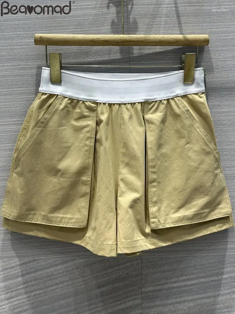 Shorts voor dames Baeromad modeontwerper zomer ivoor witte kleur casual elastische taille slanke multi -pocky rechte vatbroek broek