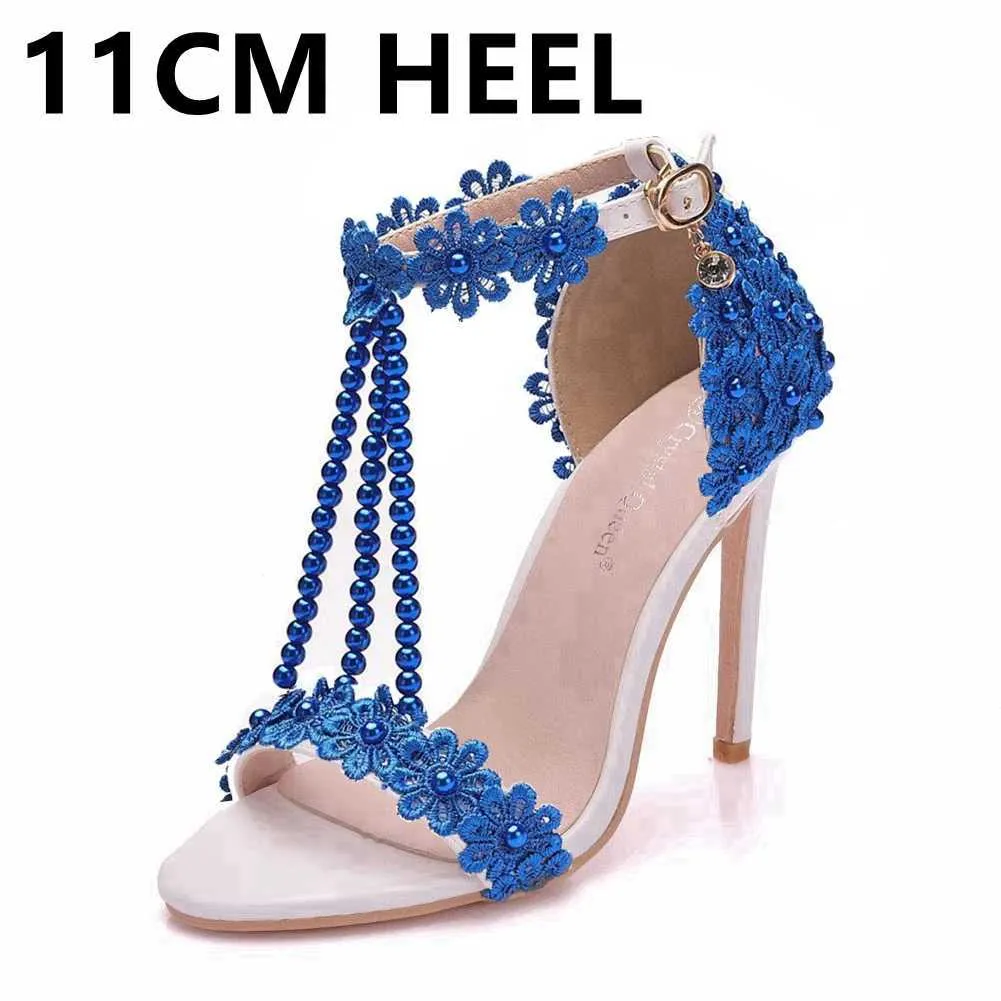 SURET Buty Crystal Queen Women Sandals Białe koronkowe kwiaty Pearl Tassel Małże ślubne Super cienkie wysokie obcasy Smukły ślub H240409 Hvne