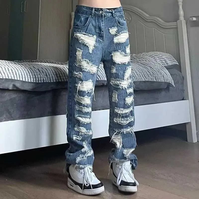 Pantaloni da uomo in stile americano buco rotto jeans sciolto cento pantaloni da uomo streetwear jeans baggy y2k jeans jeans strappato maschi pantaloni j240409