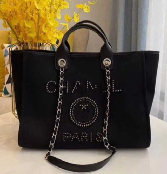 Fashion CH Women039S Luxury Evening Bags Brand Canvas Handbag Classic Pearl Beach Hand Bag Designer Stora ryggsäck Små förpackningar 2840137