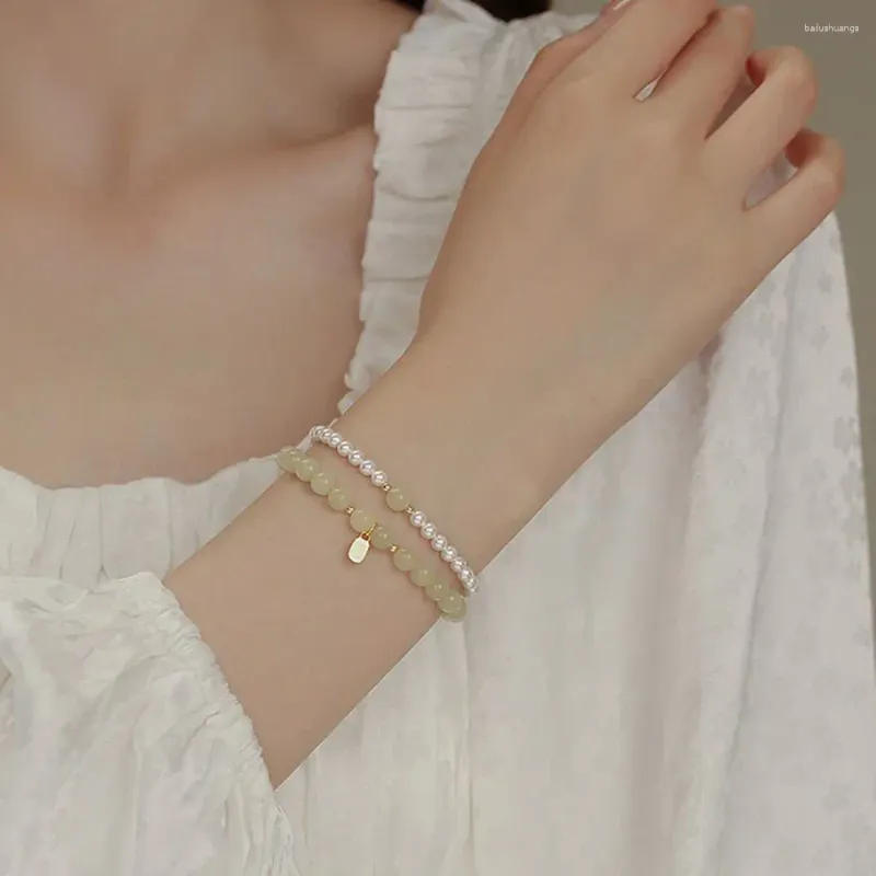 Strand Fashion Fu merkimitatie Hetian Jade Transfer Pearl kralen Bracelet Dames Luxe witte temperament sieraden