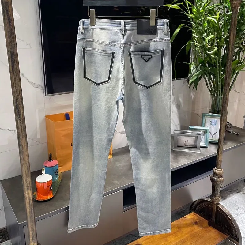 Famoso marchio europeo motociclista in stile americano jeans uomini jeans sottili grigio chiaro pantaloni da uomo pantaloni in denim cerniera nero pantaloni a matita jeans